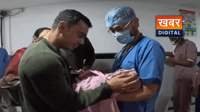 Shivraj Singh Chauhan holding newborn granddaughter